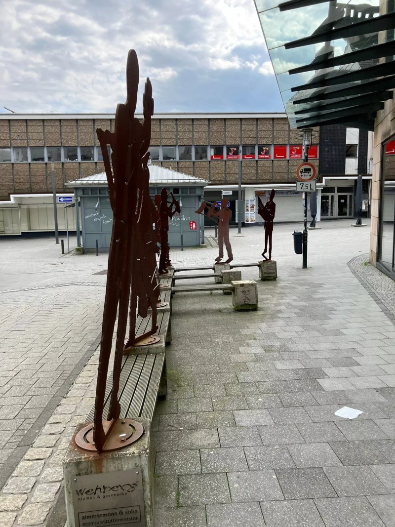 Skulptur Touristen