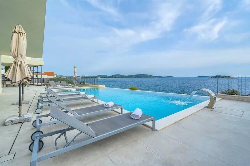 Villa Valiosa - stunning beachfront villa with a pool and a sauna for ten guests