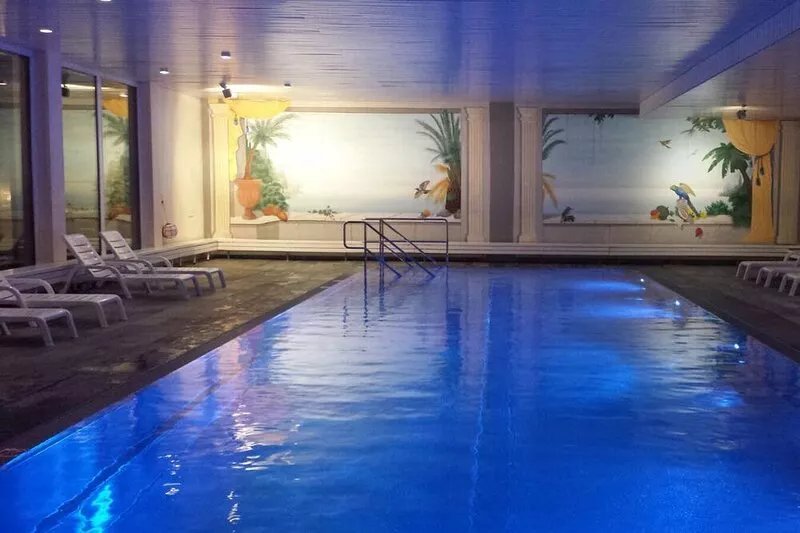 Indoor pool, sauna, outdoor pool, tennis court, covered parking lot, fitness