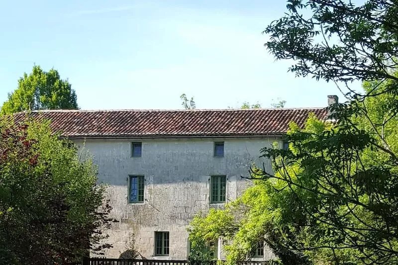 Riverside cottages & watermill in Pons with heated swim spa / pool