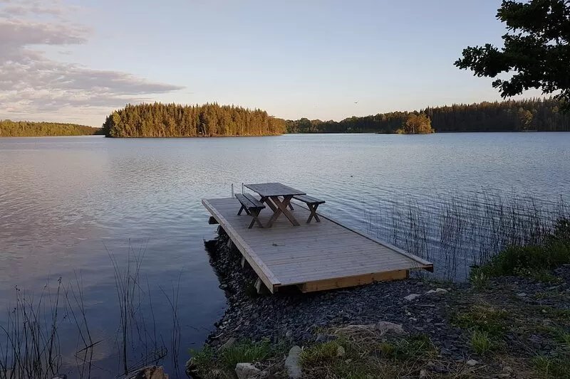 Newly built modern house solely located directly by the lake with its own dock