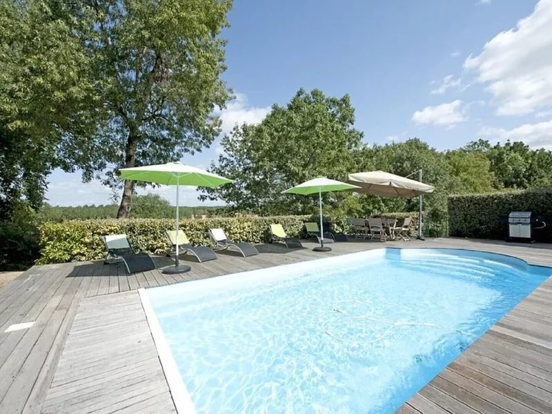 Rural country retreat with private heated pool and driving range!