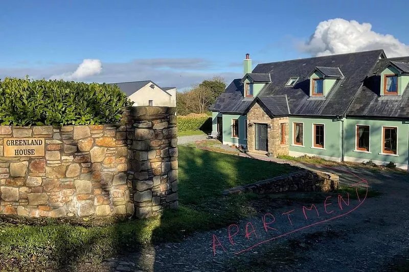 Country home with a view of green fields