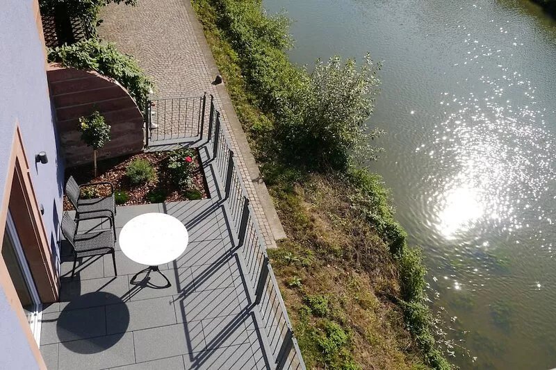 Fantastic apartments with a sun terrace directly on the shores Tauber