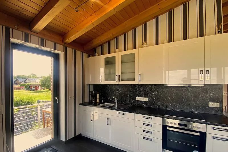 Quietly situated vacation apartment with a unique distant view near the Rursee