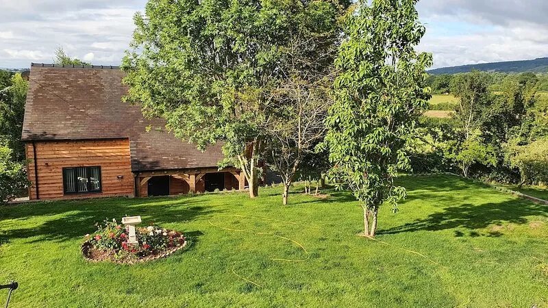 Lovely dog friendly cottage 4 miles from Ludlow with feature oak glass gable.