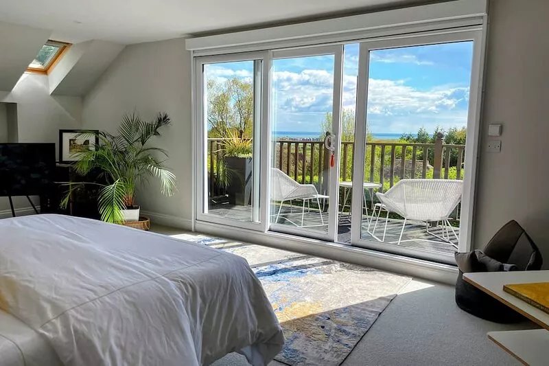 London meets Port Lympne in this comfortable contemporary bungalow.