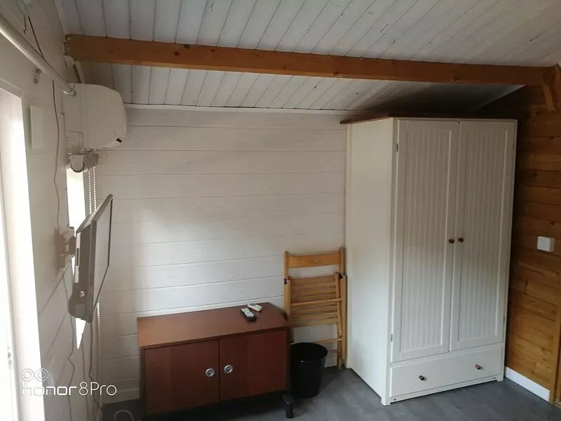 Two cottages separated by a small patio 200m from the beach