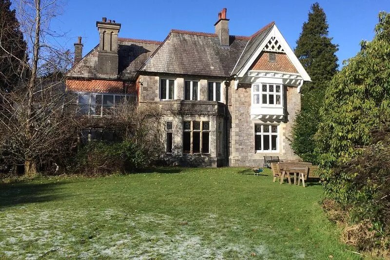 Country House With Bluebell Wood In Dartmoor National Park