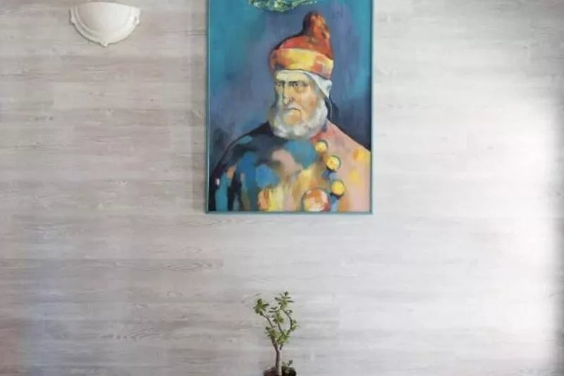 Pink artist's house on the edge of the lagoon, overlooking Torcello and the
