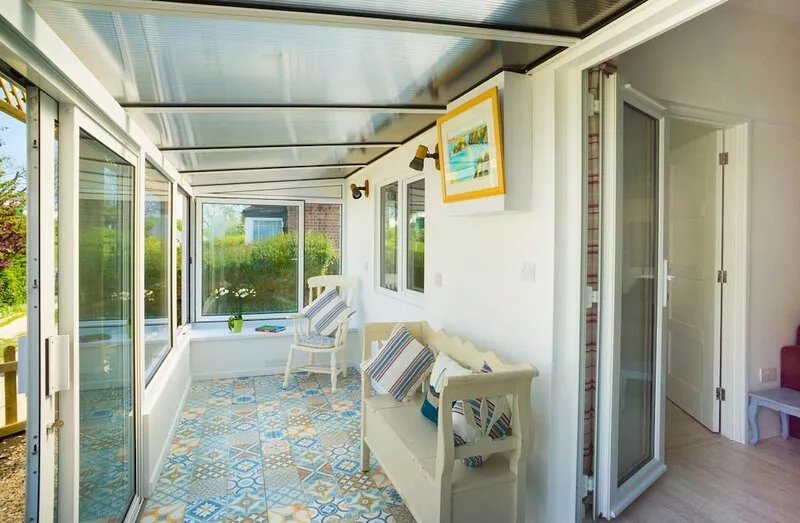 Homestead, Lyme Regis is a cosy riverside cabin, 10 mins walk from the beach