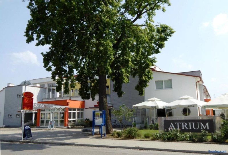 Atrium Gästezimmer und Restaurant