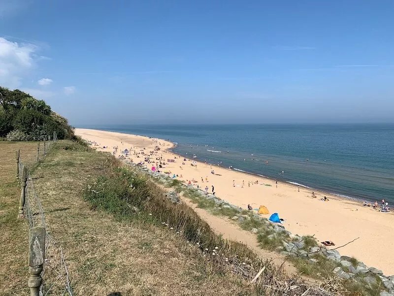 Log Cabin next to our sandy beach with lovely sea views, close Norfolk Broads.