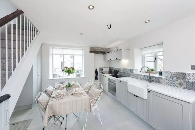 Cosy contemporary  cottage in village with own courtyard & original features.