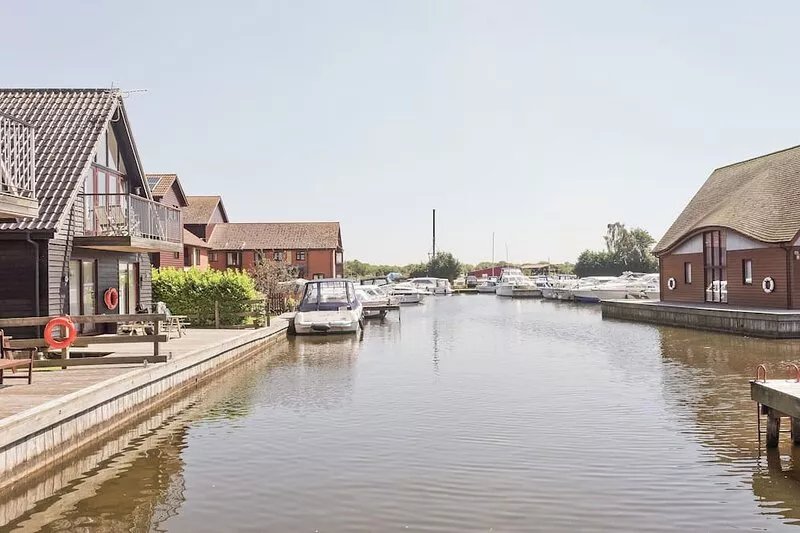 A perfect waterside setting, with a veranda overlooking the marina and private