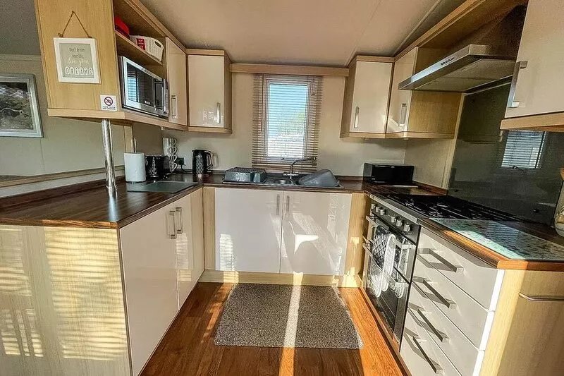 6 berth caravan for hire with decking at Heacham Holiday Park ref 21001E