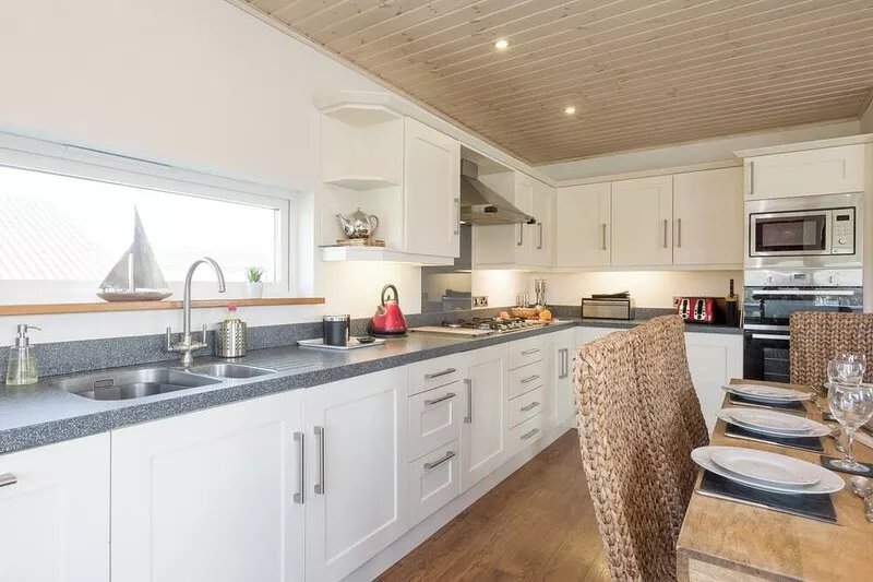 Swedish timber-style house, with sauna and hot tub, on a 400-acre estate.
