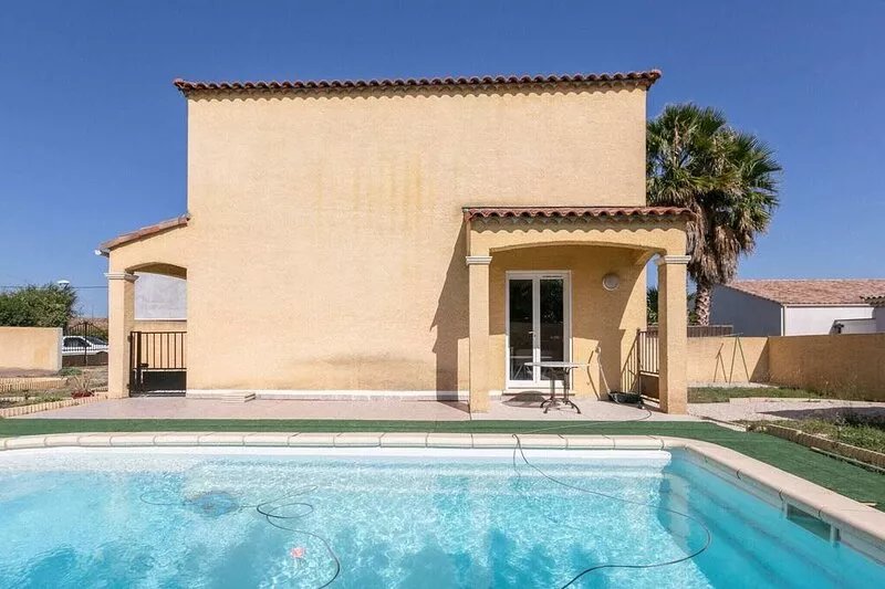 Holiday home near beach with private pool