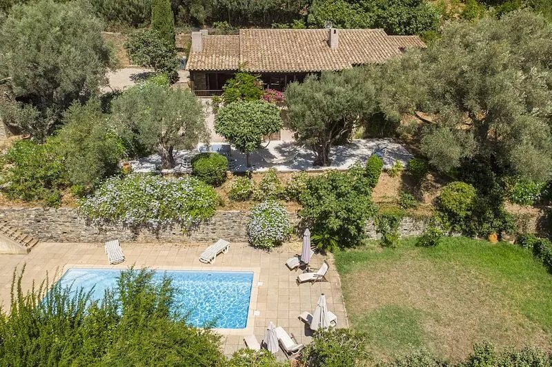 rental house with pool near beach shaded garden