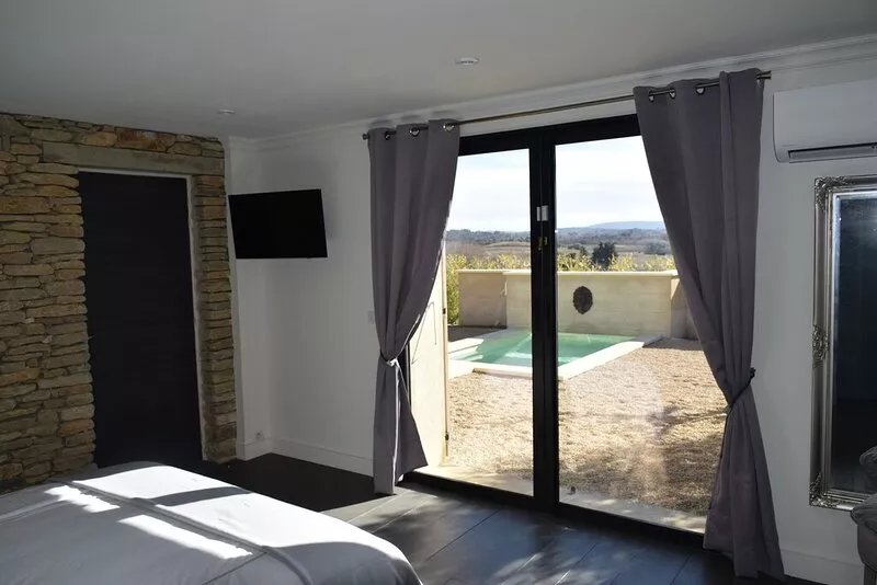 LE MAZET D'EMILIA with private garden and pool in the countryside