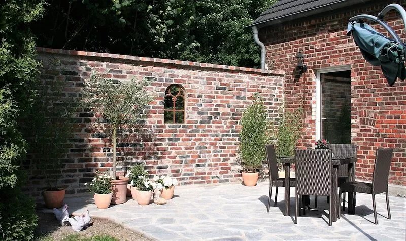 Loft apartment with garden + fireplace in the 100 year old house Niederrhein