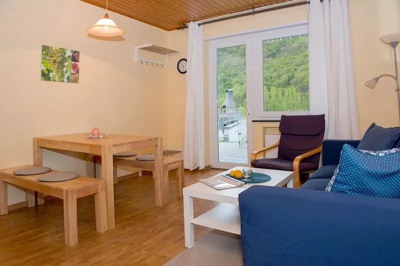 Large sun-drenched terrace with a view of the Moselle