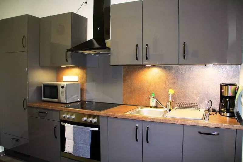 Central, bright + cozy vacation apartment (64 sqm) on the ground floor of an