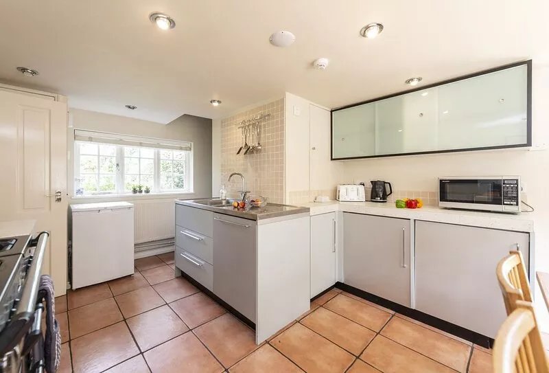 River cottage sits in a pretty rural setting with its own enclosed garden