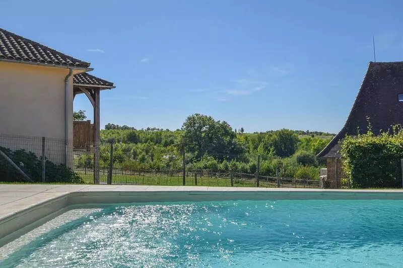 Holiday home with private heated pool