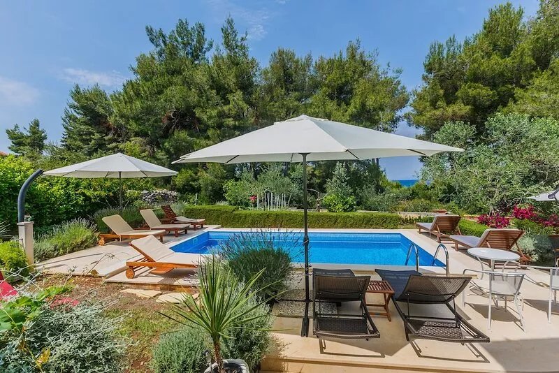 Big family villa with pool, quiet & green location, just 2 minutes walk to beach