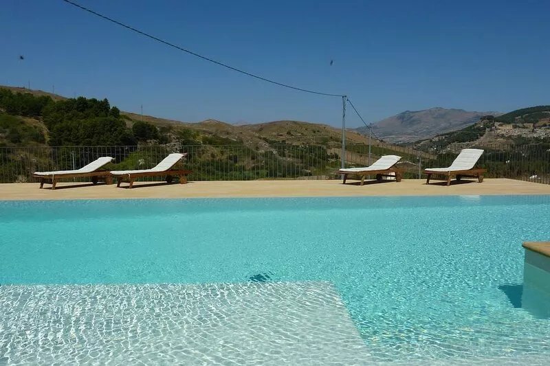 Farmhouse, lovingly restored, surrounded by green countryside of Calatafimi