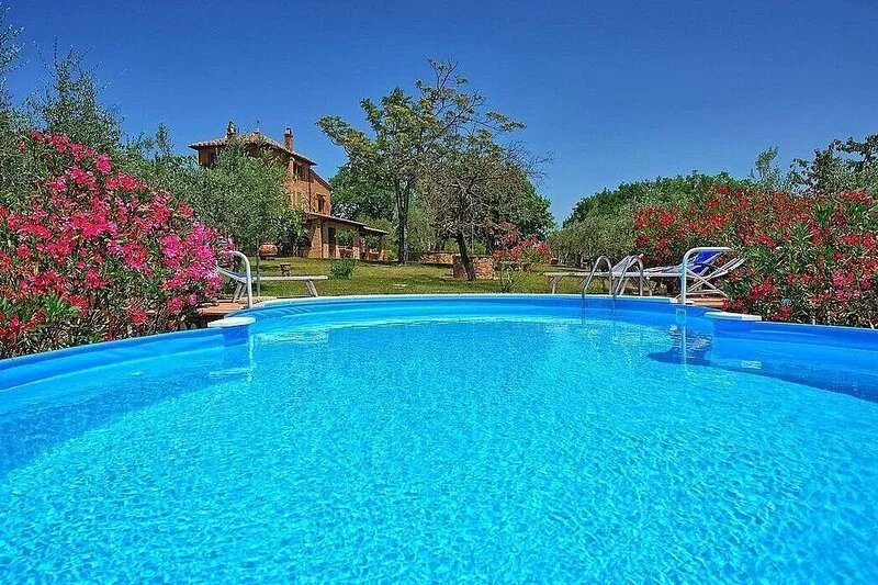 Casa Moscatella: A characteristic three-story age-old farm house surrounded by