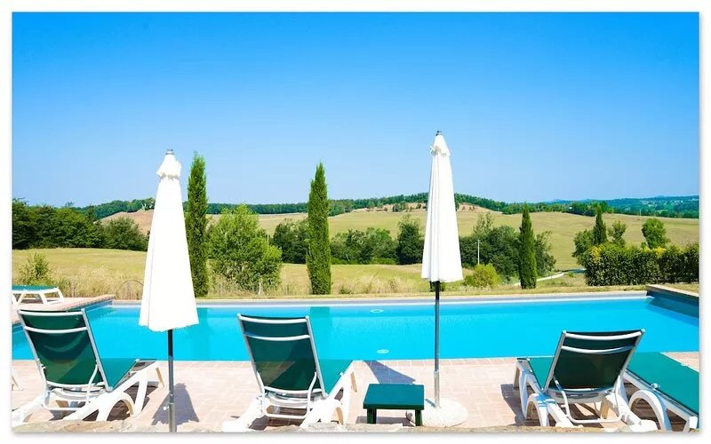 Tuscan village in SIena. farmhouse surrounded by garden,pool and panoramic view