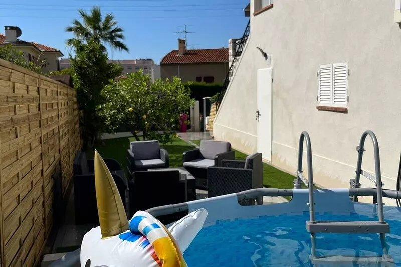 Superb upstairs villa with private garden and parking.