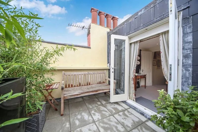 Comfortable double bedroom with ensuite bathroom, sitting room & roof terrace
