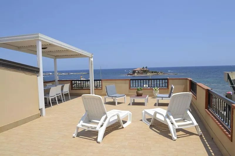 house in the center of marzamemi facing the sea