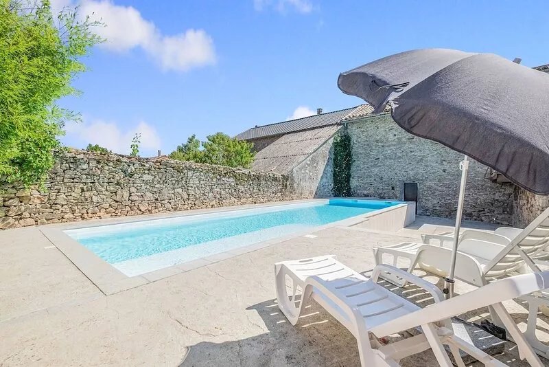 Character house with swimming pool in village