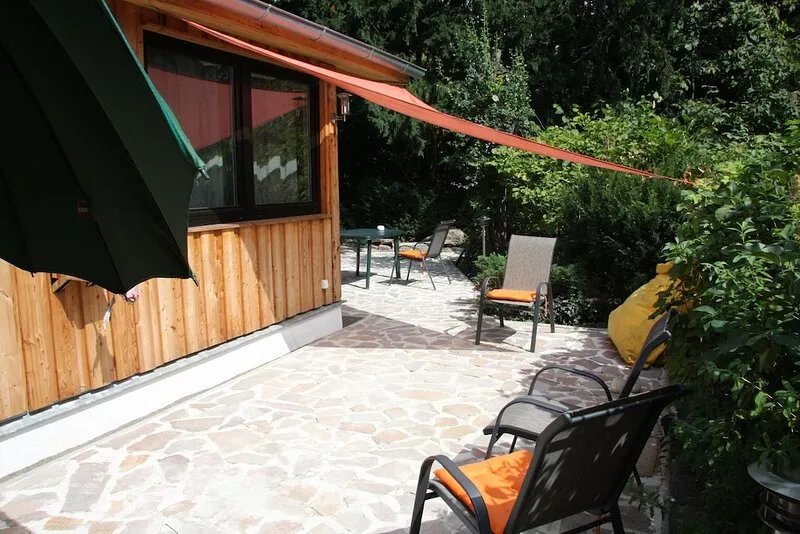 Modern bungalow with fireplace in a green setting from 65 Euro per day