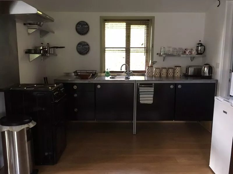 The Garden Room. Timber framed, light and airy accommodation with veranda.