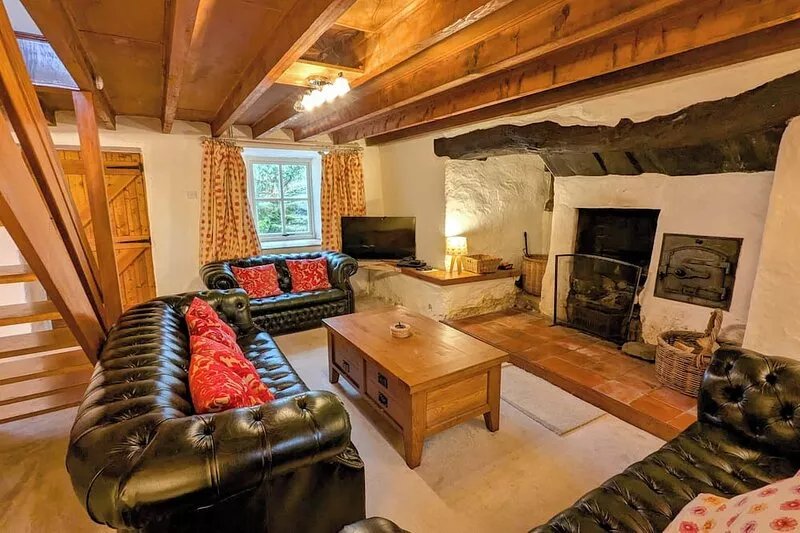 Traditional 18th century farmhouse on the slopes of a mountain