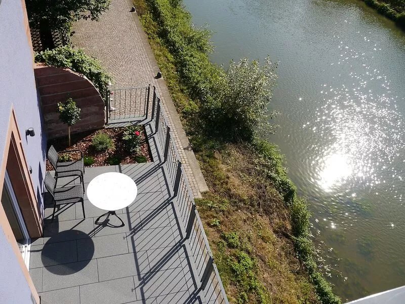Fantastic apartments with a sun terrace right on the banks of the Tauber