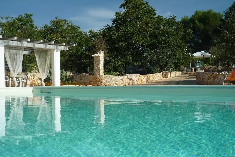 Trulli in the Itria Valley with swimming pool and pine forest with hammocks