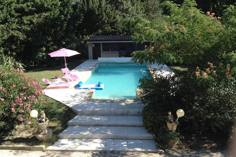 Apartment in an authentic Mas with swimming pool in a wooded park.