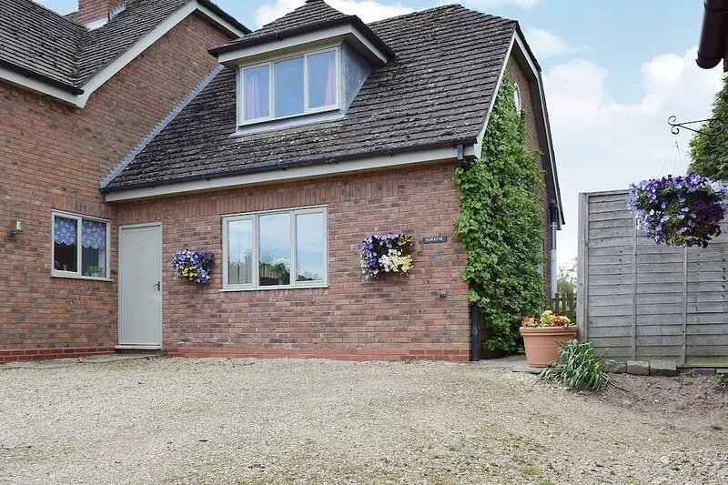 In a quiet location with fishing available on site, surrounded by fields, ideal