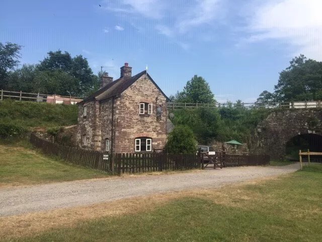 A canalside cottage, within Goytre Wharf on the Monmouthshire & Brecon Canal