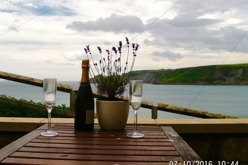 Situated in the heart of the village, within metres of the sea and sandy beach.