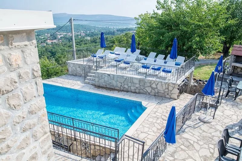 Unique apartment with roof terrace, orchard and pool, 2 km to sea
