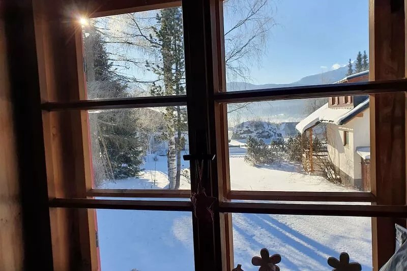 cozy house in a sunny place with a fantastic mountain panorama