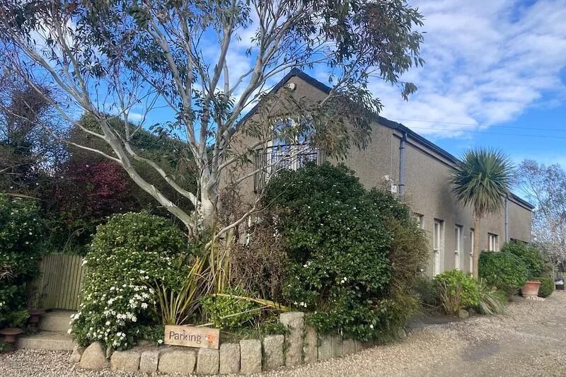 Country cottage in peaceful setting, nestled between the mountains and the sea.