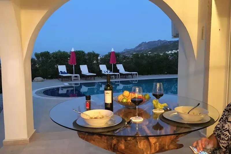 Luxury villa and private pool with spectacular mountain background and sea views